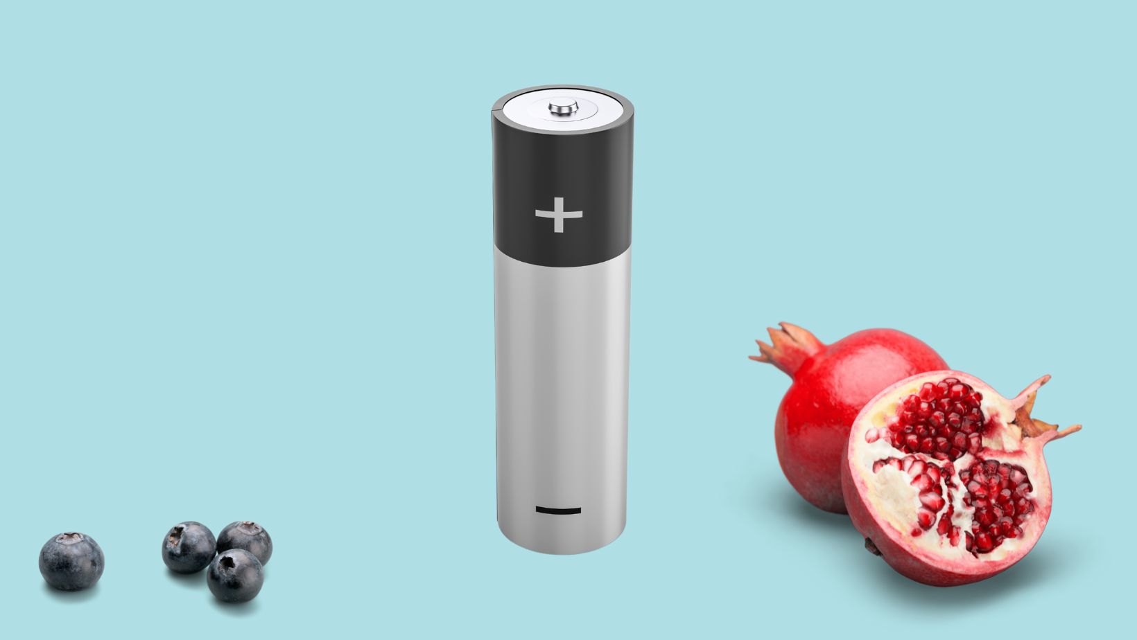 A creative composition with a cylindrical battery standing upright next to a pomegranate cut open to reveal seeds and a cluster of blueberries on a soft blue background, symbolizing natural energy sources juxtaposed with man-made power storage.